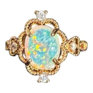 NWOT Rose Gold simulated opal ring size 7.